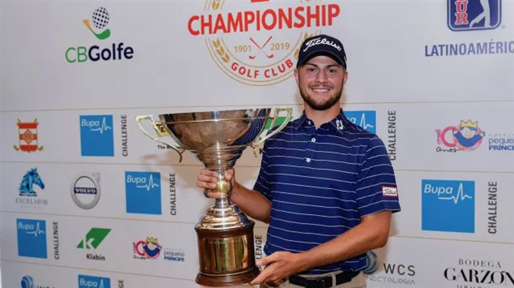 Chandler Blanchet smiles with the winner's trophy after his victory at the San Paolo GC Championship