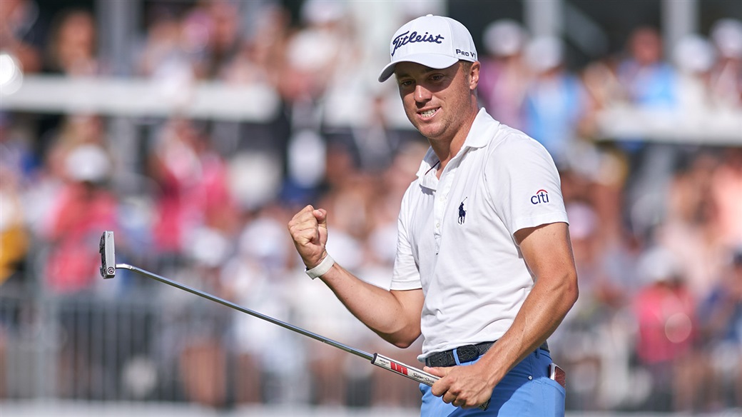 Justin Thomas celebrates after holing the winning putt with his Pro V1x golf ball at the 2019 BMW Championship