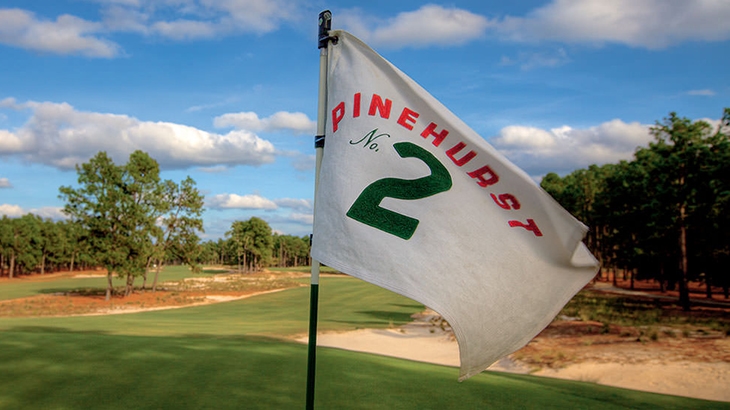 A pin flag on the green at Pinehurst No. 2